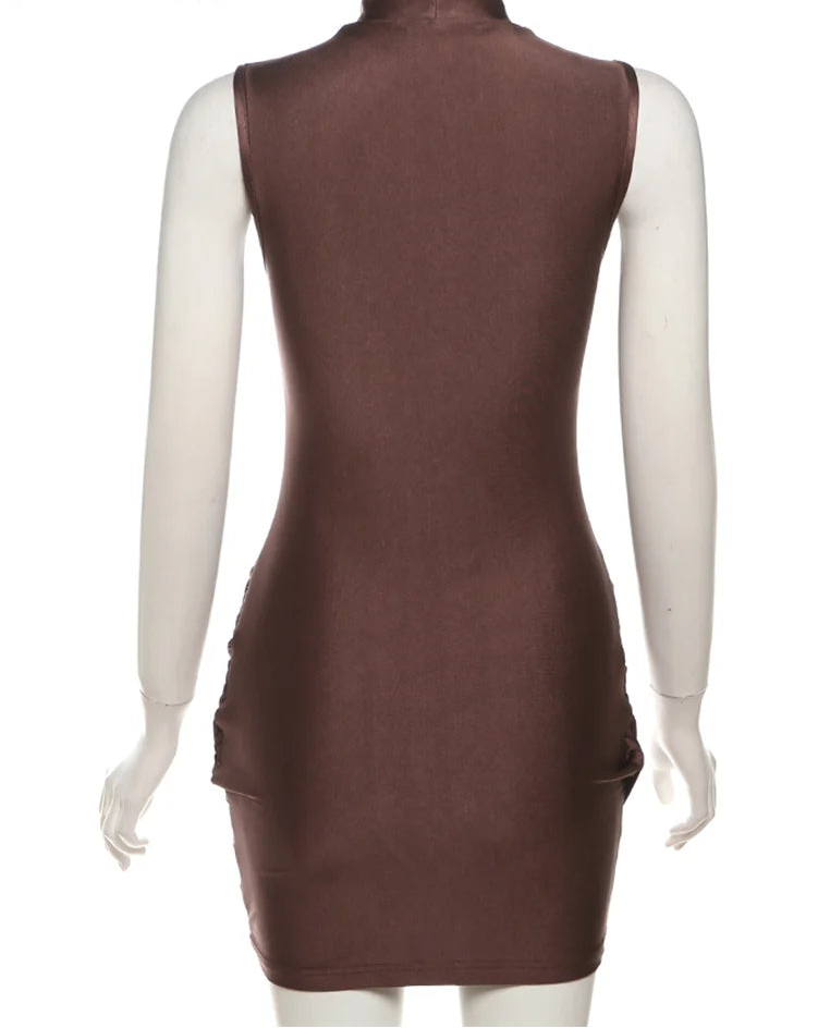 Brown dress on a mannequin with 'WeirdPuss' branding.