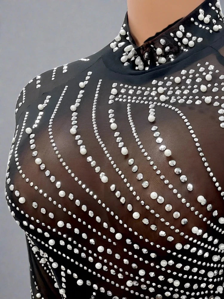 Glamour Glissade: The Feathered Fantasy Dress