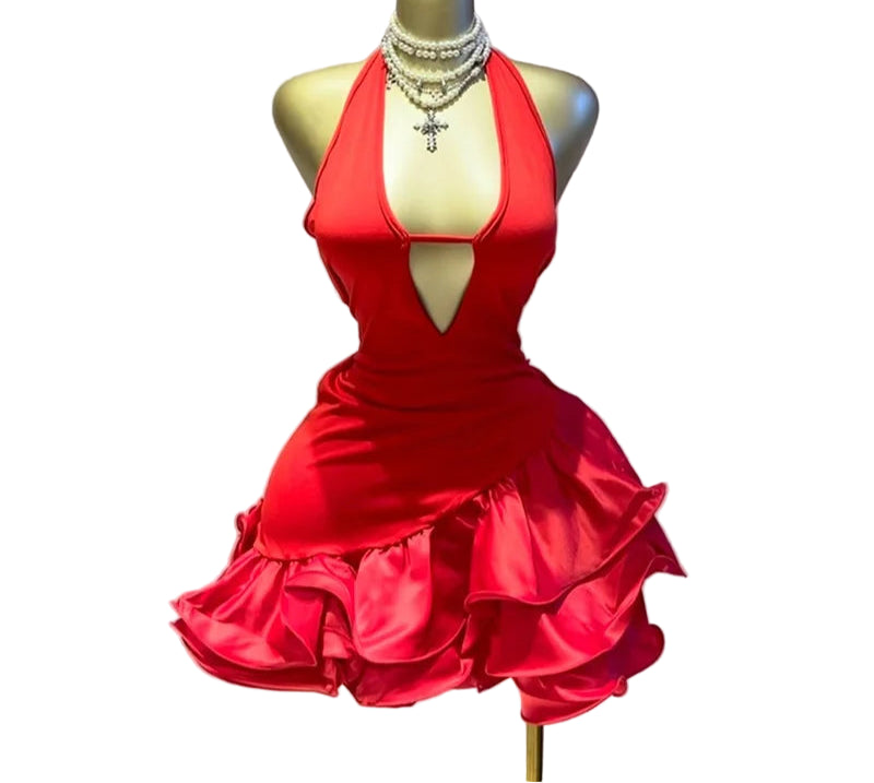 Red dress on a mannequin against a light background