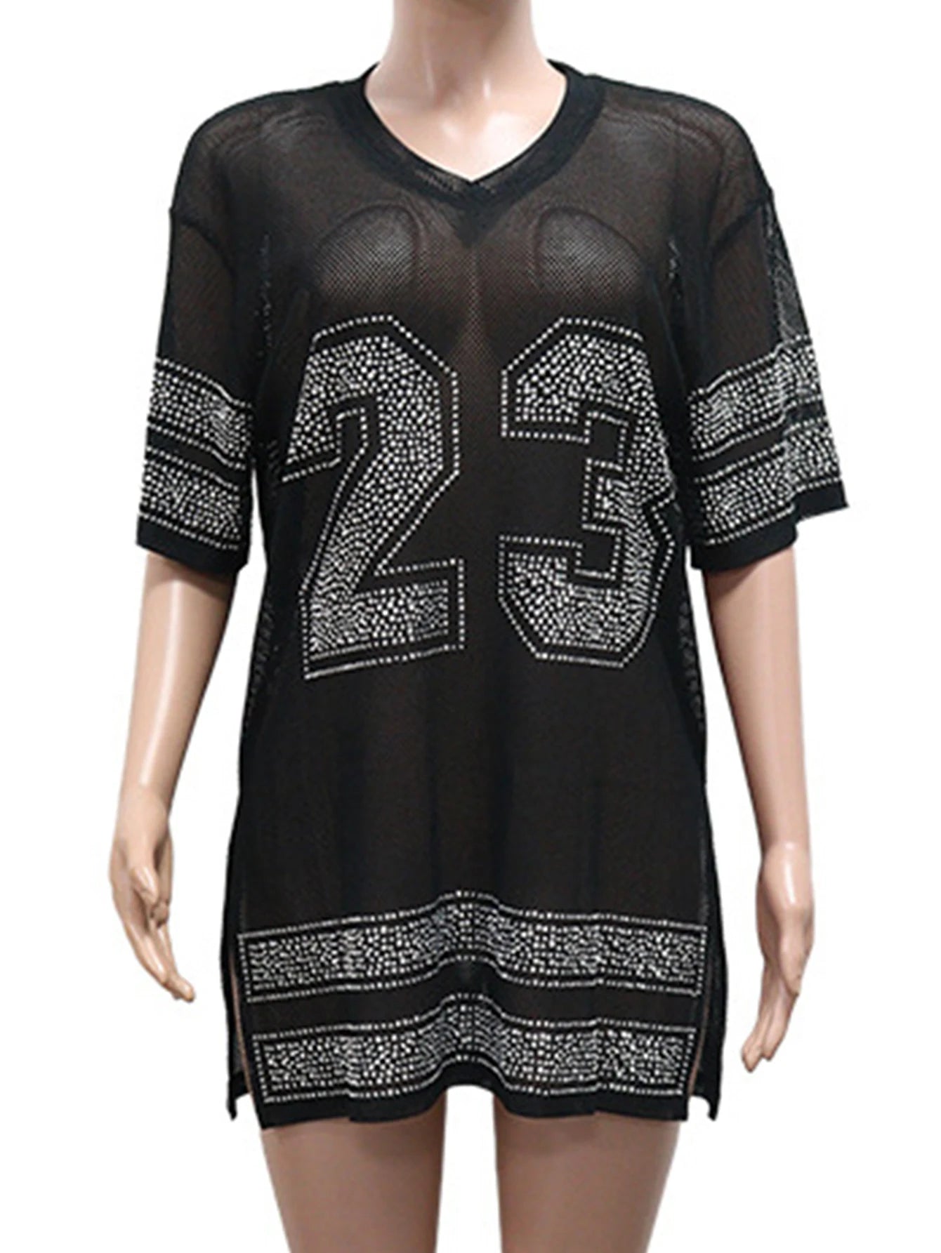 Black dress with number 23 design on a mannequin against a white background