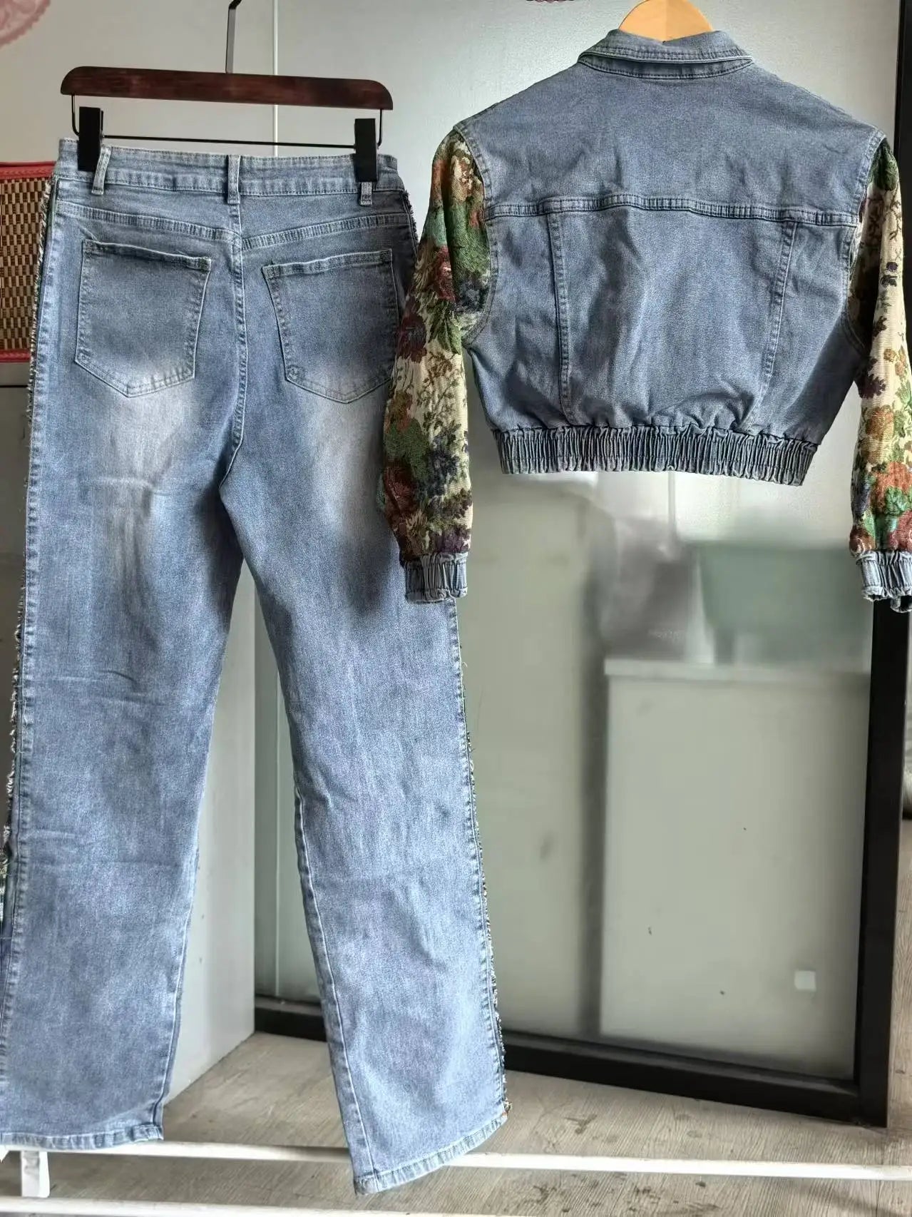 Denim Blossom Beauty: The Rebel Petal Jacket & Ripped Jeans Ensemble