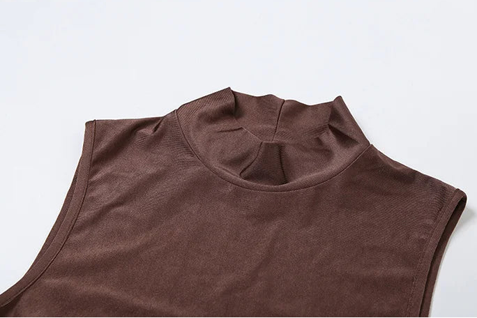 Brown sleeveless top on a white background with 'WeirdPuss' branding.