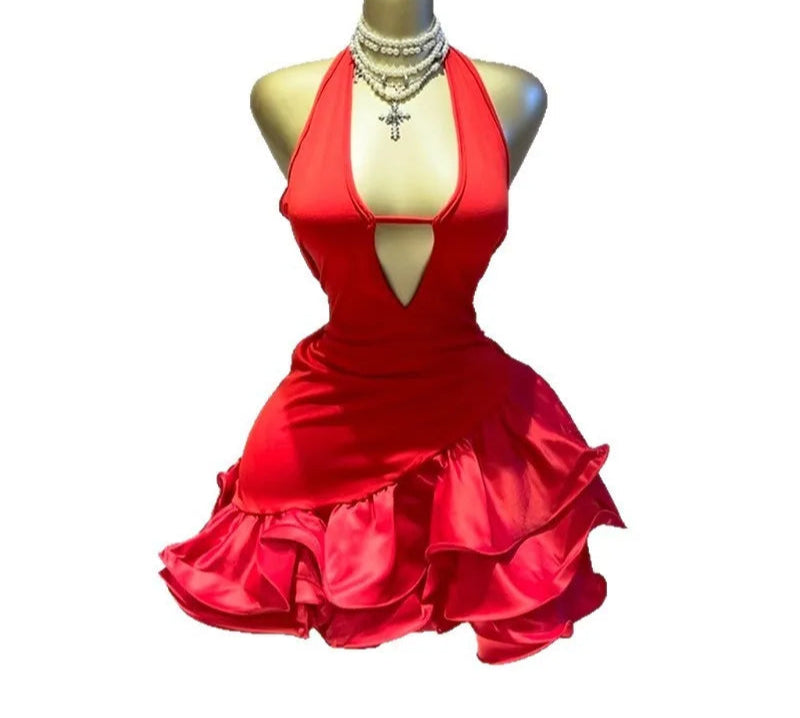 Red dress on a mannequin with GLCMYAYA branding.
