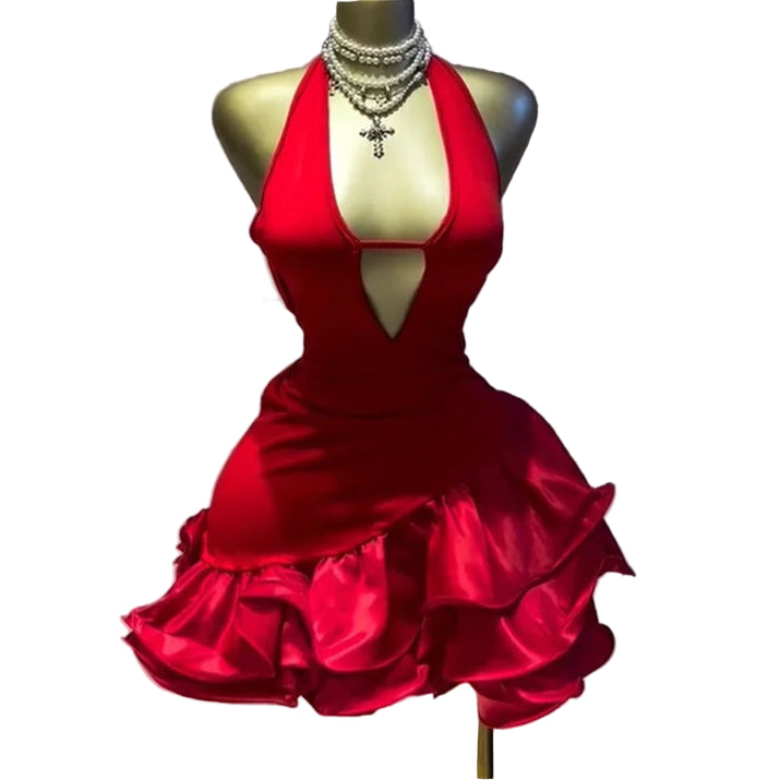 Red dress on a mannequin against a neutral background